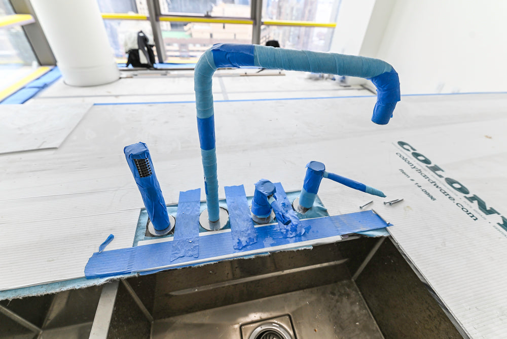 Custom Transitional White Kitchen with Island and Quartzite Countertops