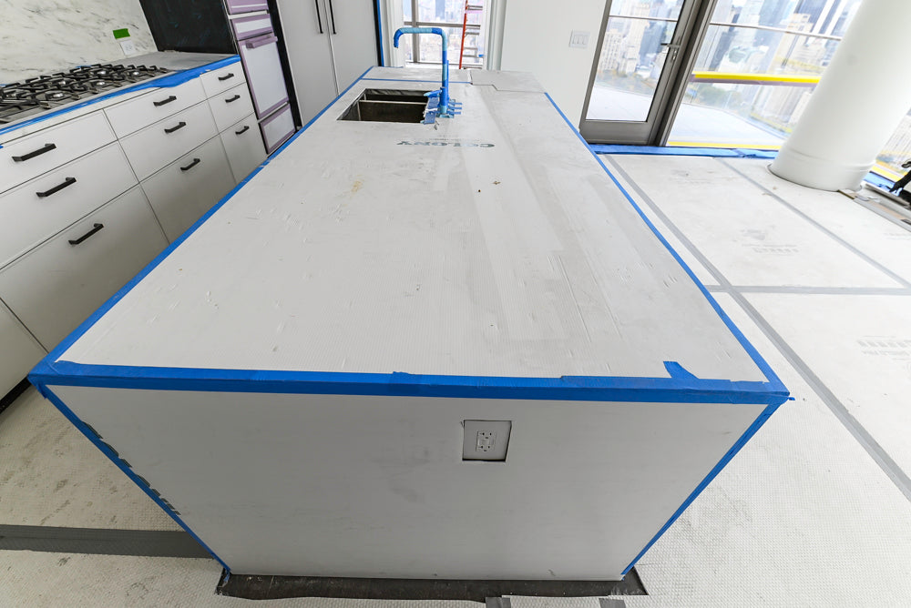 Custom Transitional White Kitchen with Island and Quartzite Countertops 