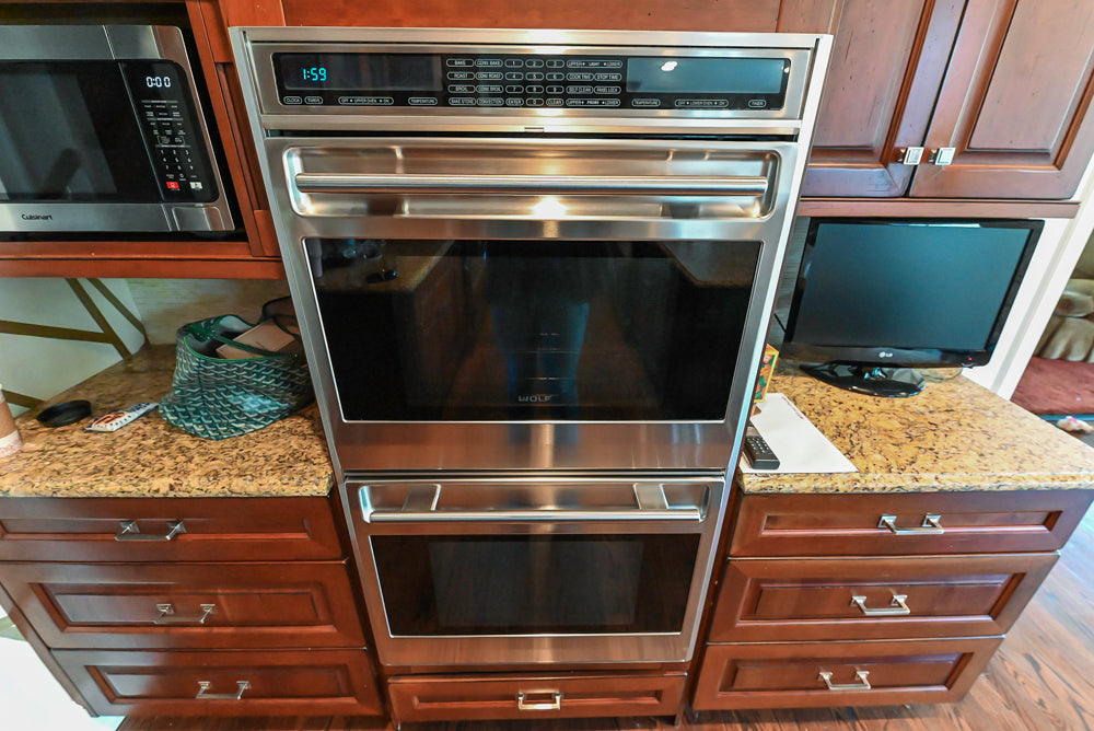 Century Traditional Cherry Kitchen with Granite Countertops and Sub-Zero and Wolf Appliances