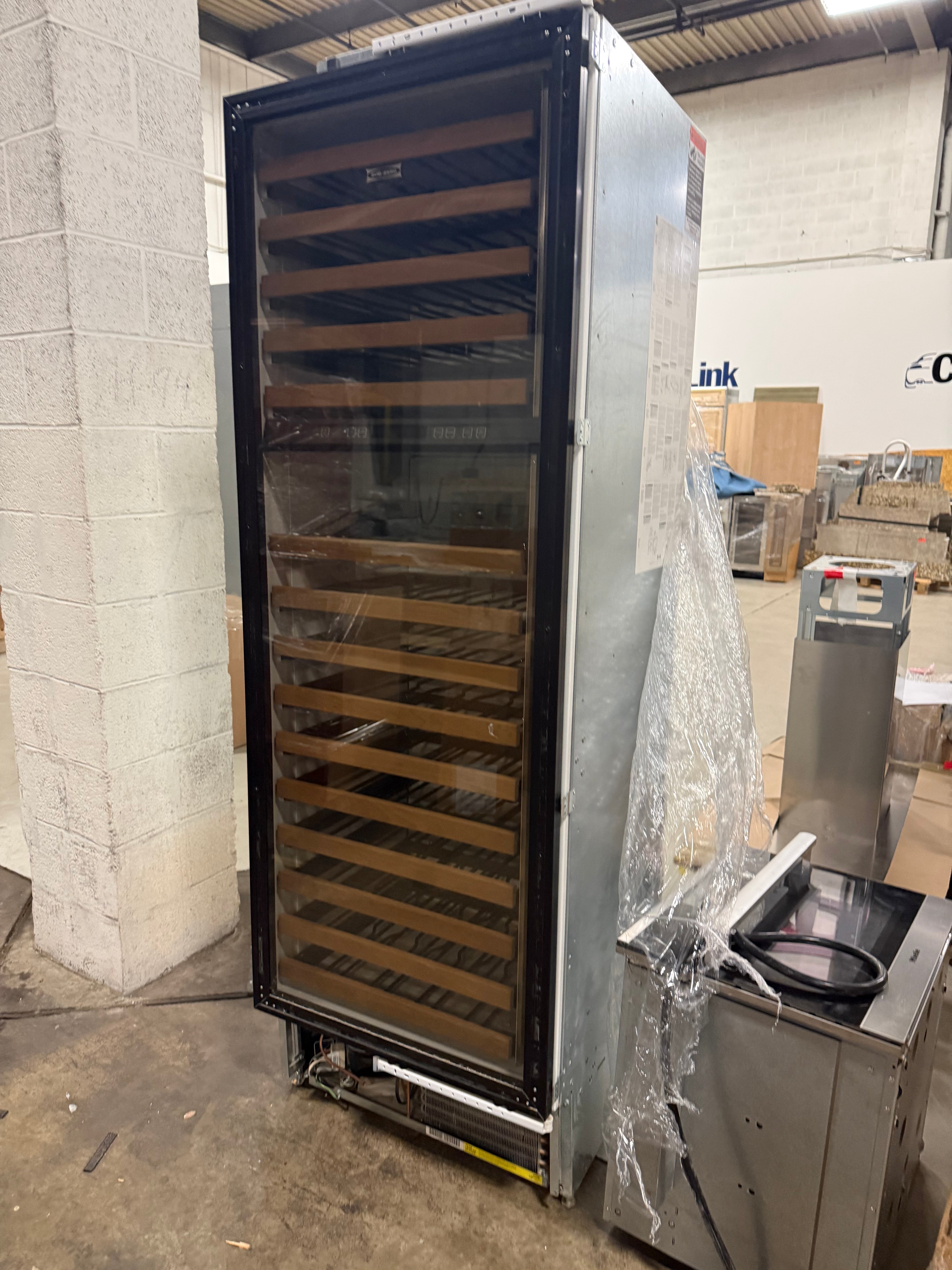 Luxury 78 bottle dual-zone wine cooler with cherry wood racks by Sub-Zero