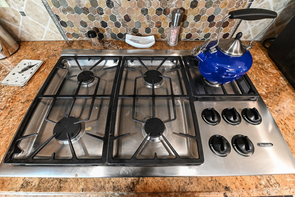 “The Harcourt” Traditional Two-Tone Distressed Kitchen with Green Island, Quartz Countertops and Appliances