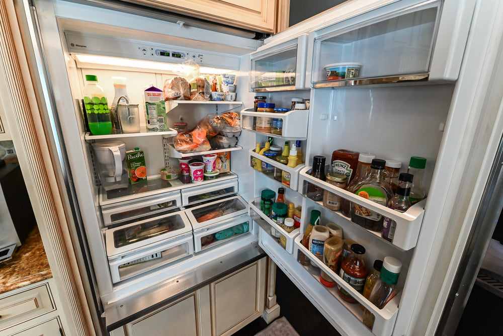 “The Harcourt” Traditional Two-Tone Distressed Kitchen with Green Island, Quartz Countertops and Appliances