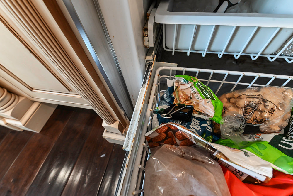 “The Harcourt” Traditional Two-Tone Distressed Kitchen with Green Island, Quartz Countertops and Appliances