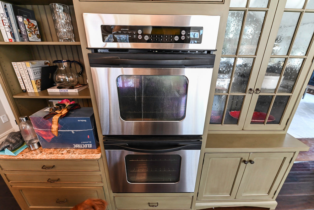 “The Harcourt” Traditional Two-Tone Distressed Kitchen with Green Island, Quartz Countertops and Appliances