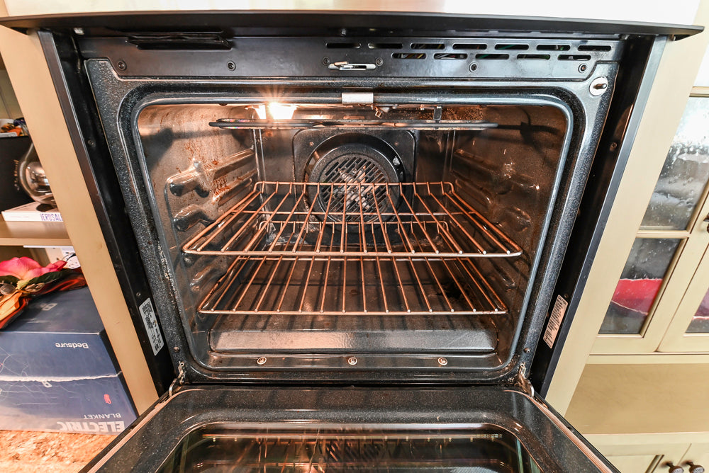 “The Harcourt” Traditional Two-Tone Distressed Kitchen with Green Island, Quartz Countertops and Appliances