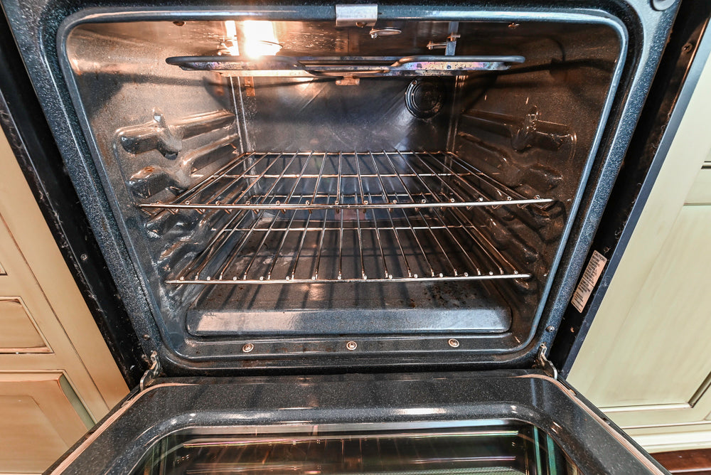 “The Harcourt” Traditional Two-Tone Distressed Kitchen with Green Island, Quartz Countertops and Appliances