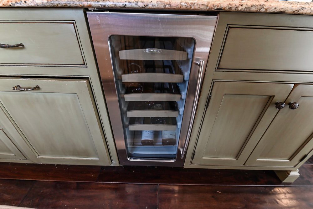 “The Harcourt” Traditional Two-Tone Distressed Kitchen with Green Island, Quartz Countertops and Appliances