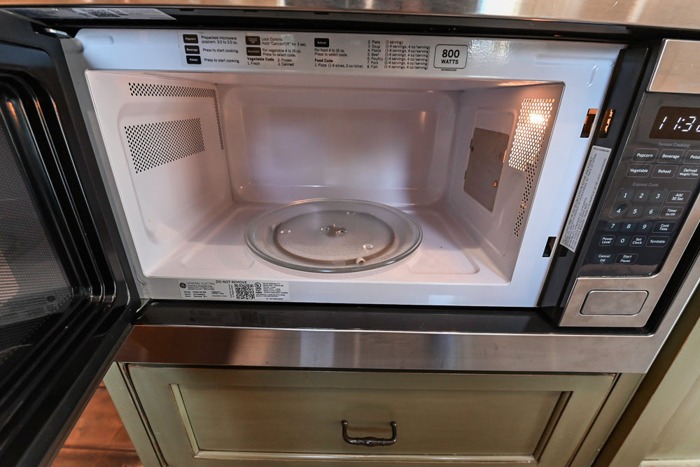 “The Harcourt” Traditional Two-Tone Distressed Kitchen with Green Island, Quartz Countertops and Appliances