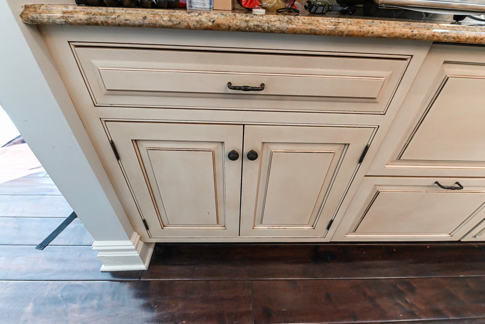 “The Harcourt” Traditional Two-Tone Distressed Kitchen with Green Island, Quartz Countertops and Appliances