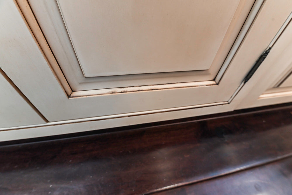 “The Harcourt” Traditional Two-Tone Distressed Kitchen with Green Island, Quartz Countertops and Appliances