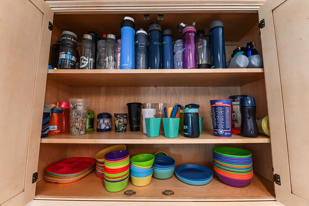 “The Harcourt” Traditional Two-Tone Distressed Kitchen with Green Island, Quartz Countertops and Appliances