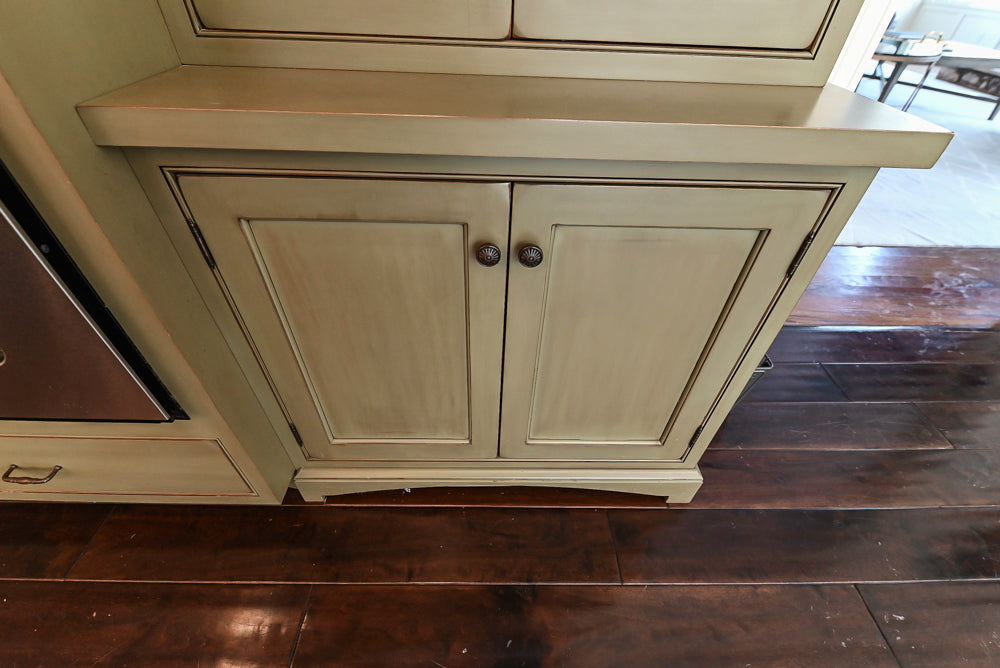 “The Harcourt” Traditional Two-Tone Distressed Kitchen with Green Island, Quartz Countertops and Appliances