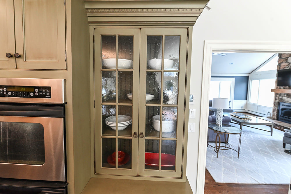 “The Harcourt” Traditional Two-Tone Distressed Kitchen with Green Island, Quartz Countertops and Appliances