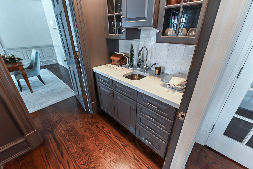 Custom Transitional Dark Grey Butler's Pantry with White Marble Countertops and Sink