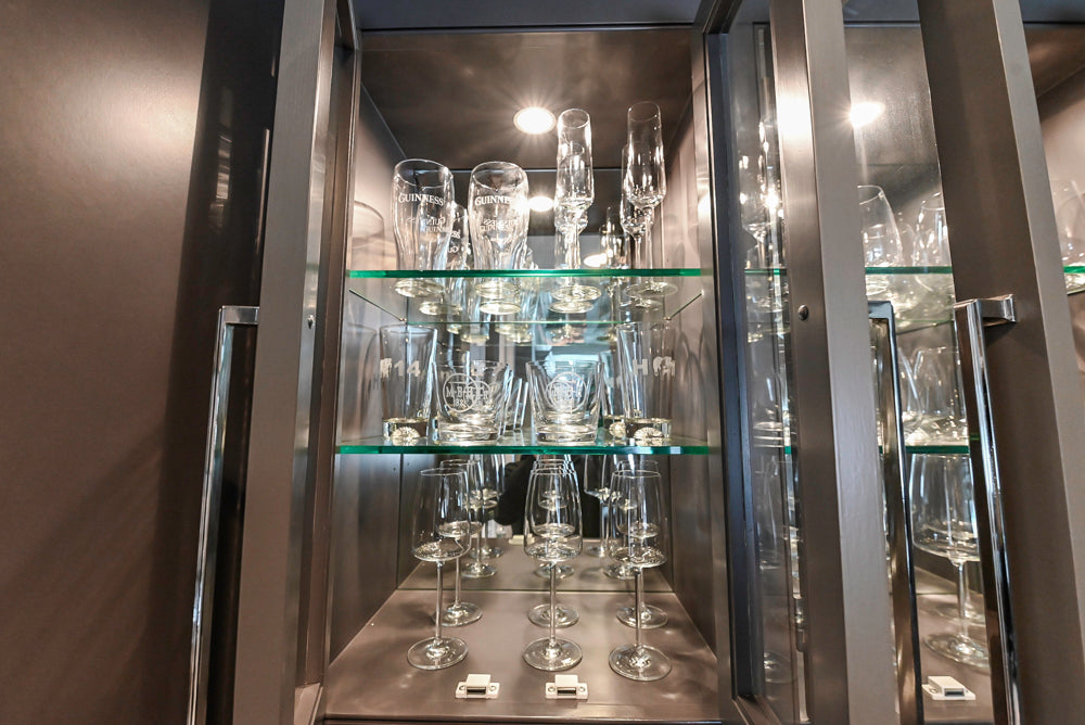 Custom Transitional Dark Grey Dry Bar with Dark Granite Countertops and Sub-Zero Wine Cooler