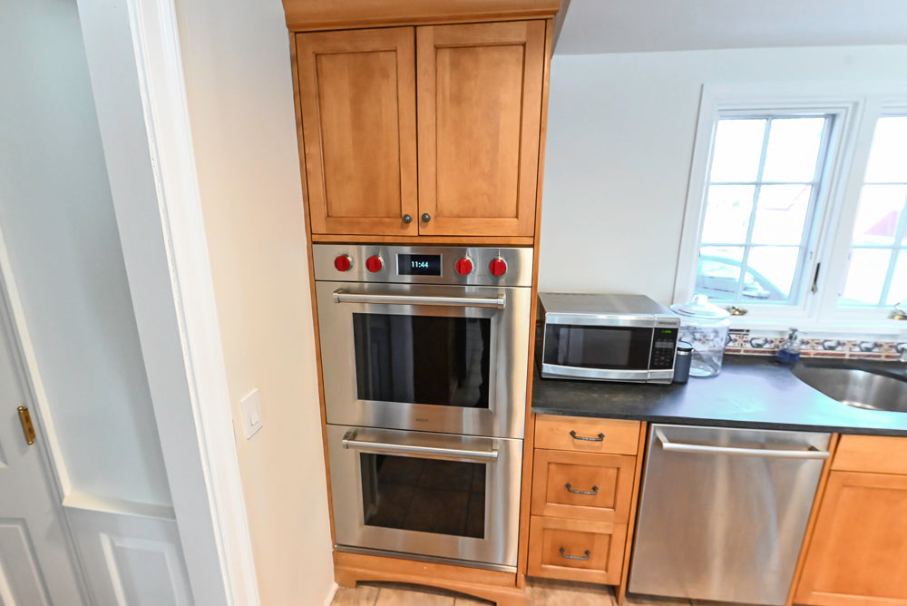 “The Whitford” Transitional Wooden Kitchen with Granite Countertops, Island & 48″ Sub-Zero Refrigerator