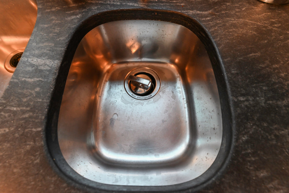 “The Whitford” Transitional Wooden Kitchen with Granite Countertops, Island & 48″ Sub-Zero Refrigerator