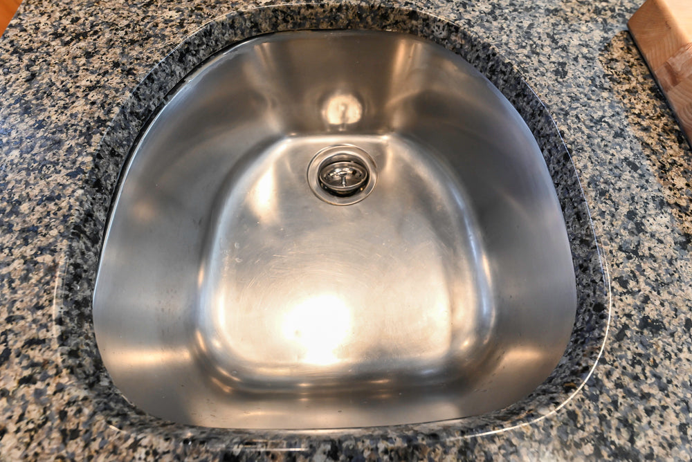 “The Whitford” Transitional Wooden Kitchen with Granite Countertops, Island & 48″ Sub-Zero Refrigerator