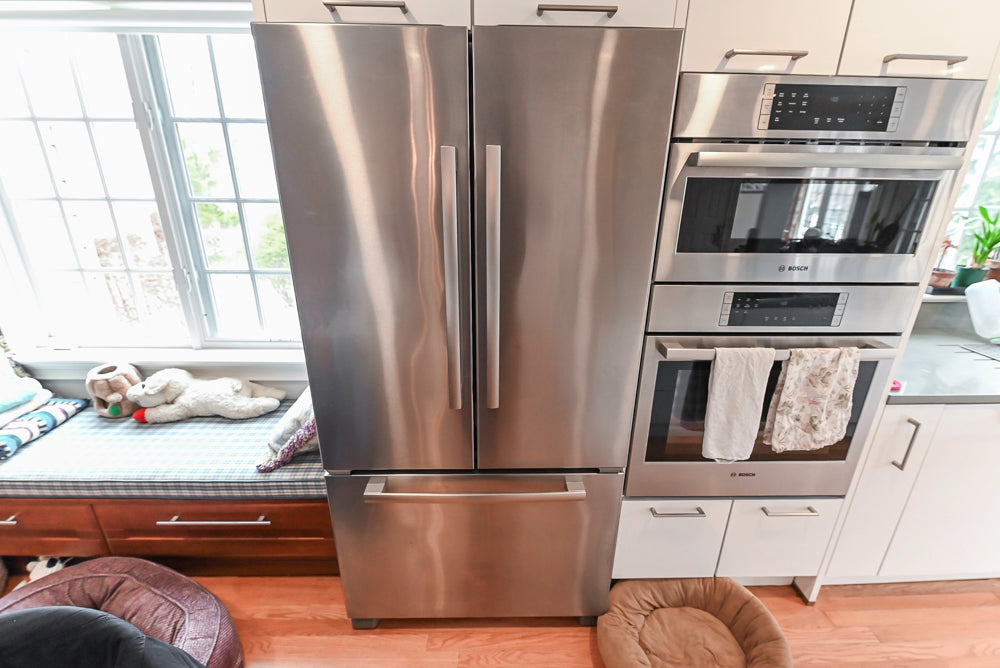 Nobilia Modern White Kitchen with Grey Stone Countertops, Island and Bosch Appliances