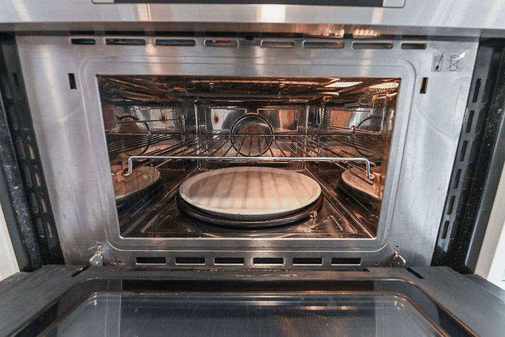 Nobilia Modern White Kitchen with Grey Stone Countertops, Island and Bosch Appliances