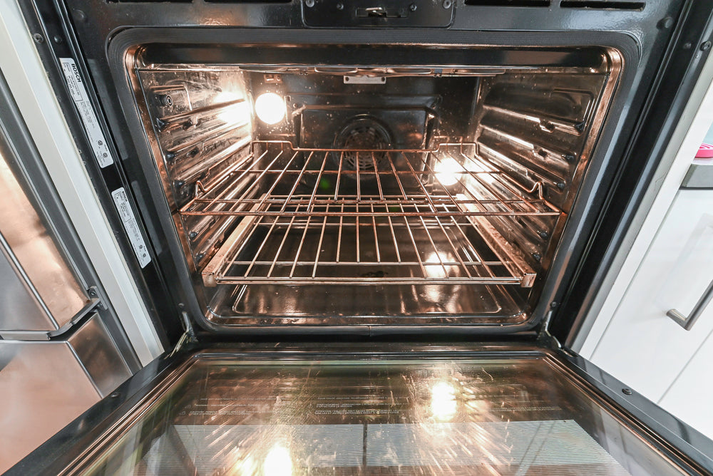 Nobilia Modern White Kitchen with Grey Stone Countertops, Island and Bosch Appliances