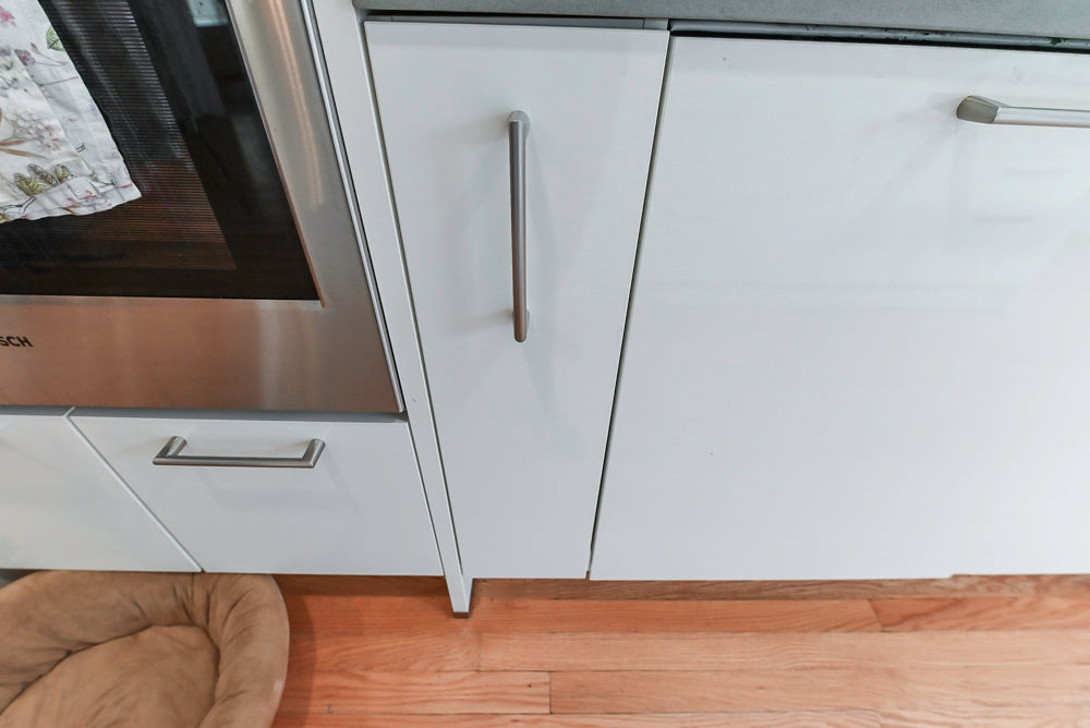 Nobilia Modern White Kitchen with Grey Stone Countertops, Island and Bosch Appliances