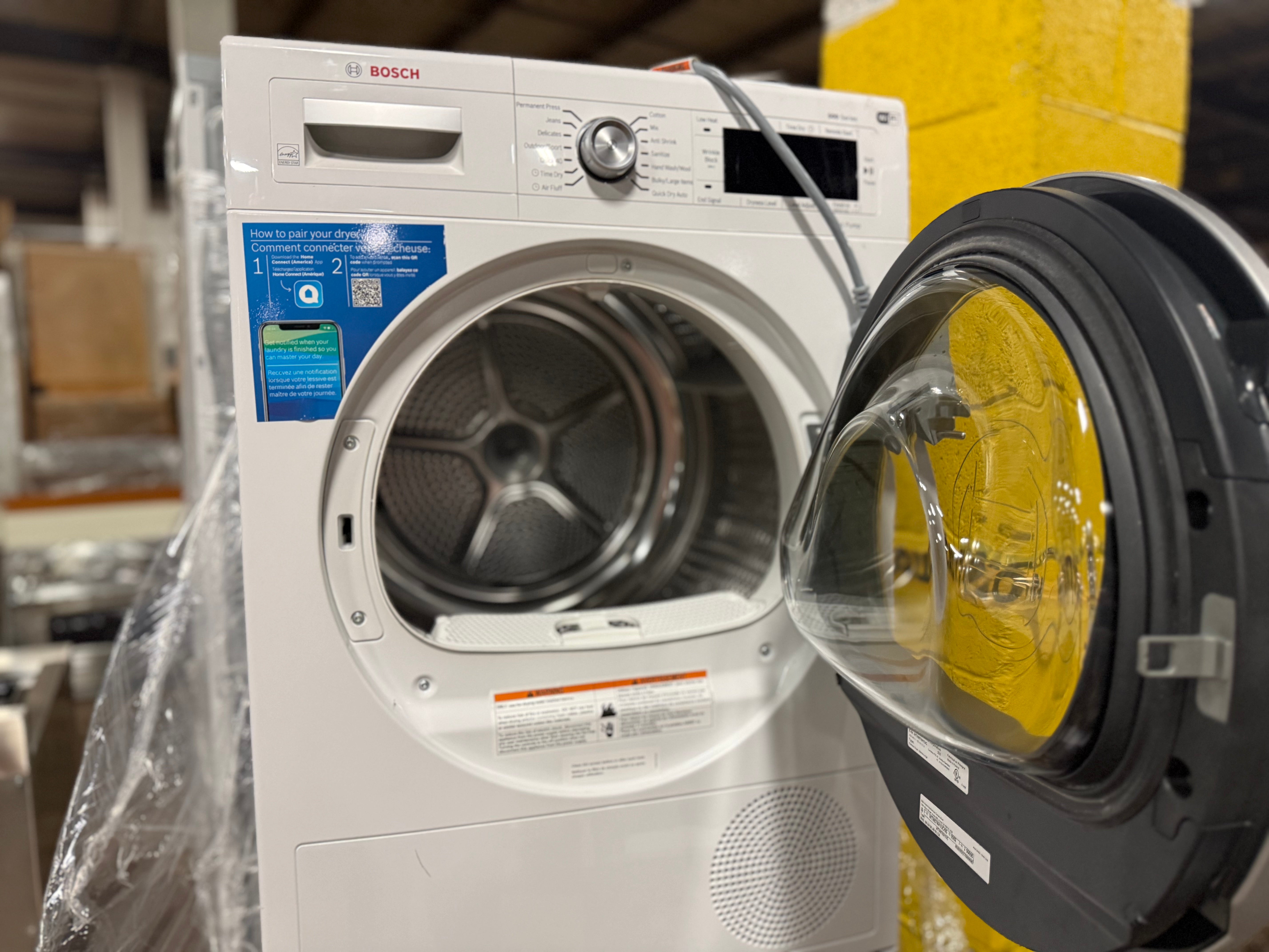 Bosch 500 Series 24" White Stacked Washer & Electric Dryer