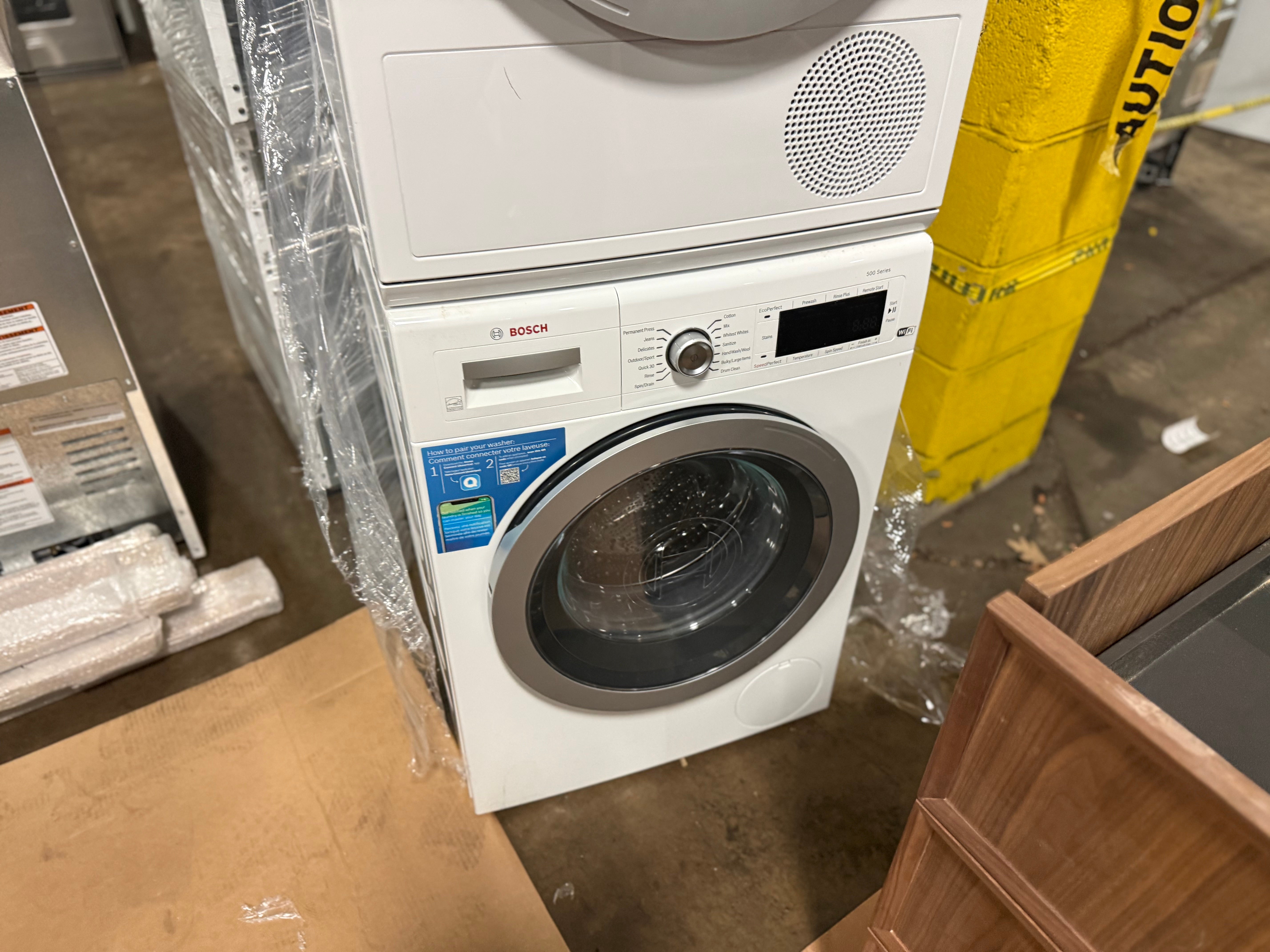 Bosch 500 Series 24" White Stacked Washer & Electric Dryer