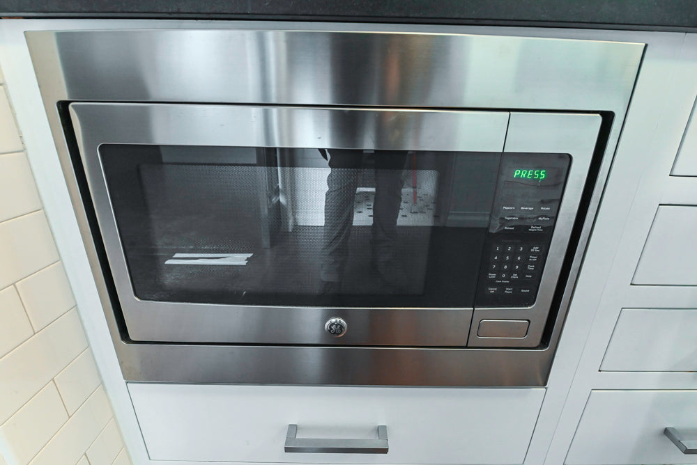Premier Custom-Built Transitional White Kitchen with Viking Appliances