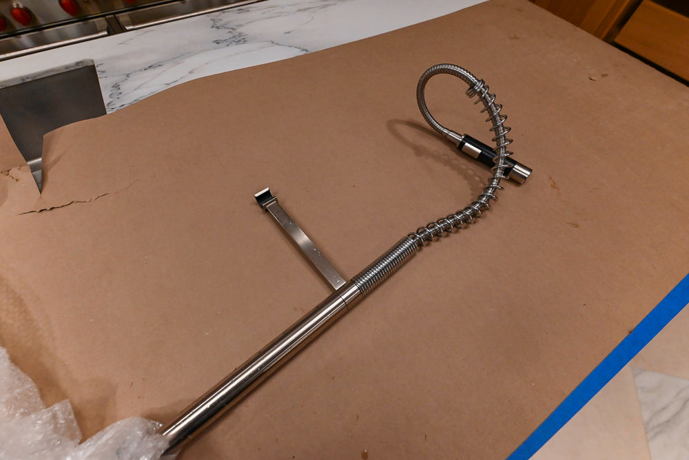 Christopher Peacock Transitional Wooden Kitchen with Waterfall Island and Marble Countertops