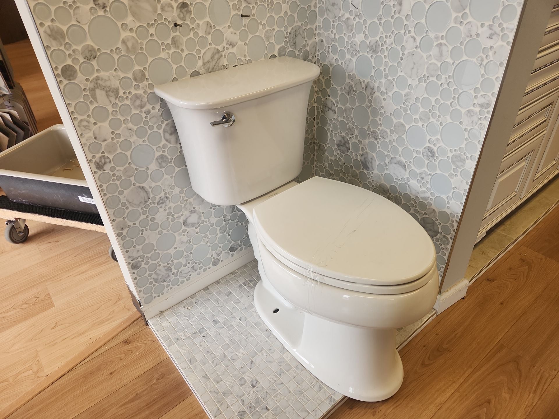 Durable residential elongated bathroom toilet by Sterling