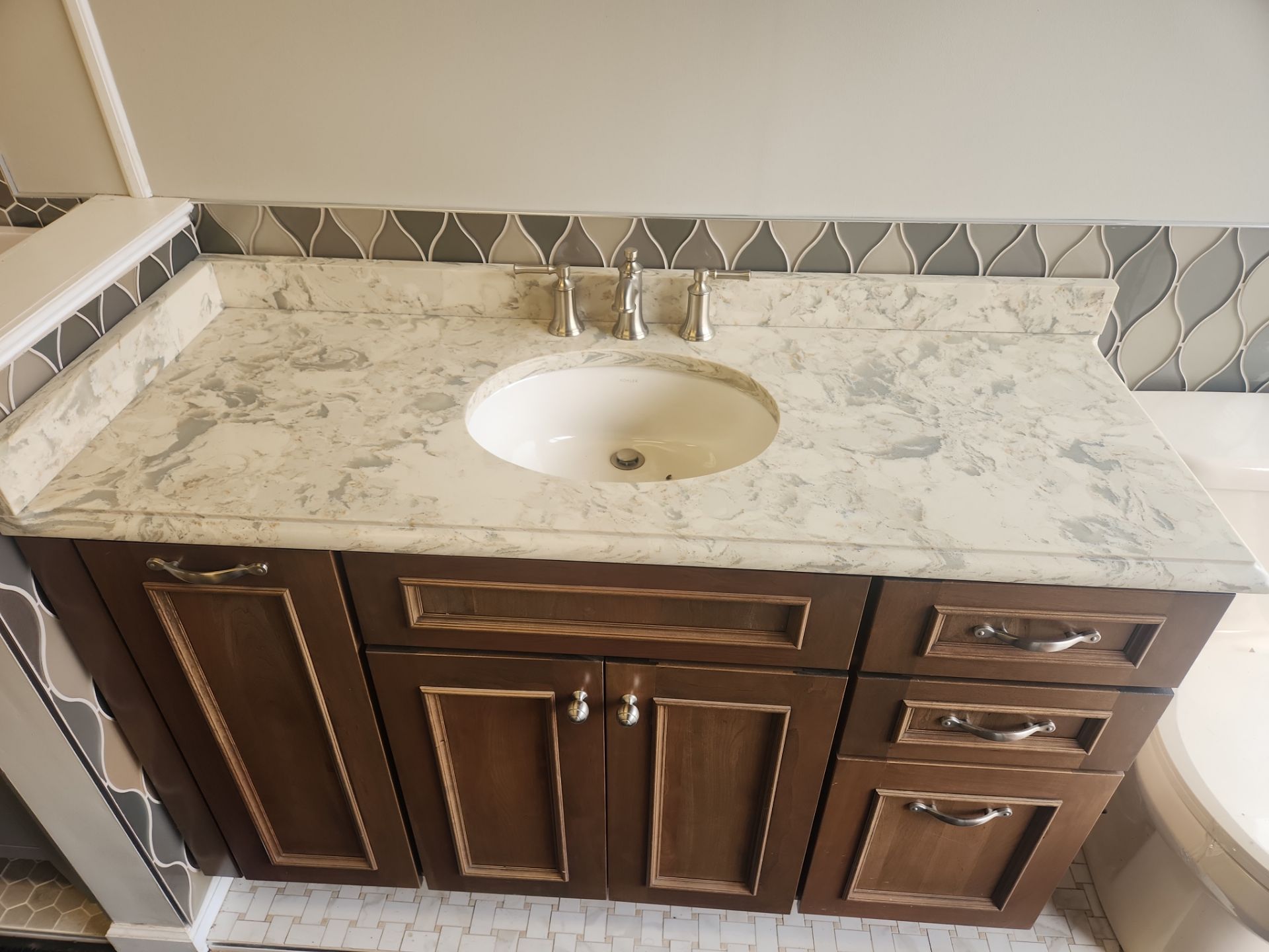 Luxury traditional furniture-grade bathroom vanity suite by Merillat