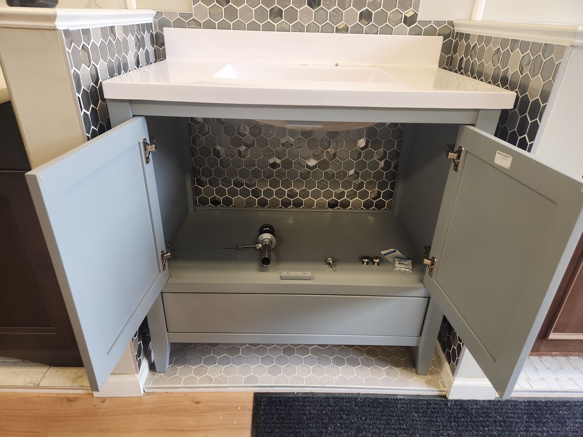 Complete 37" grey bathroom vanity with integrated stone countertop and basin