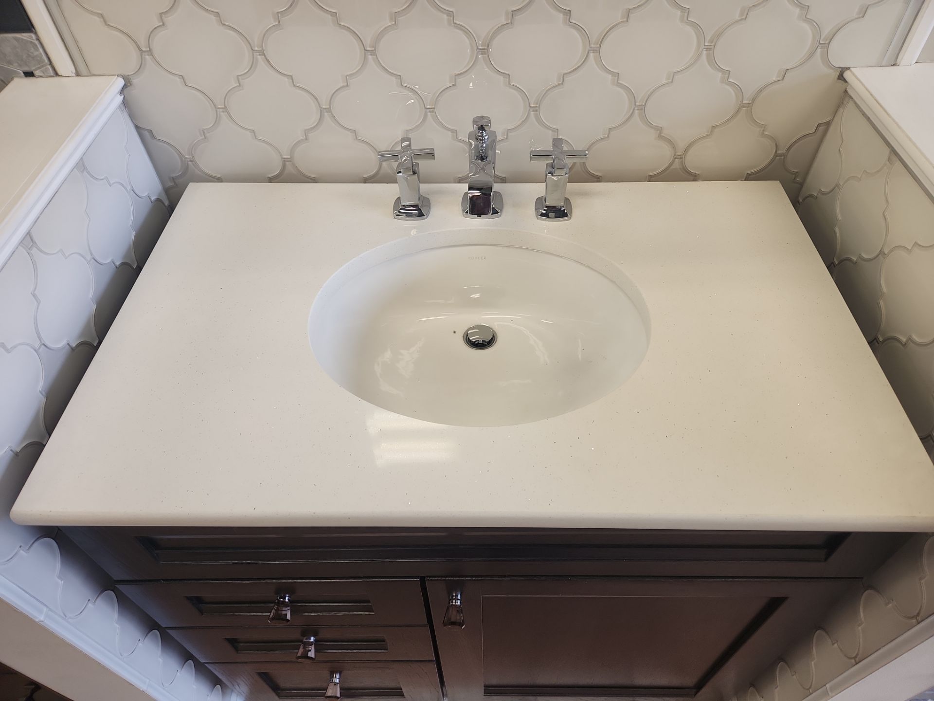Rustic-traditional bathroom vanity suite in rich slate hickory wood by Merillat