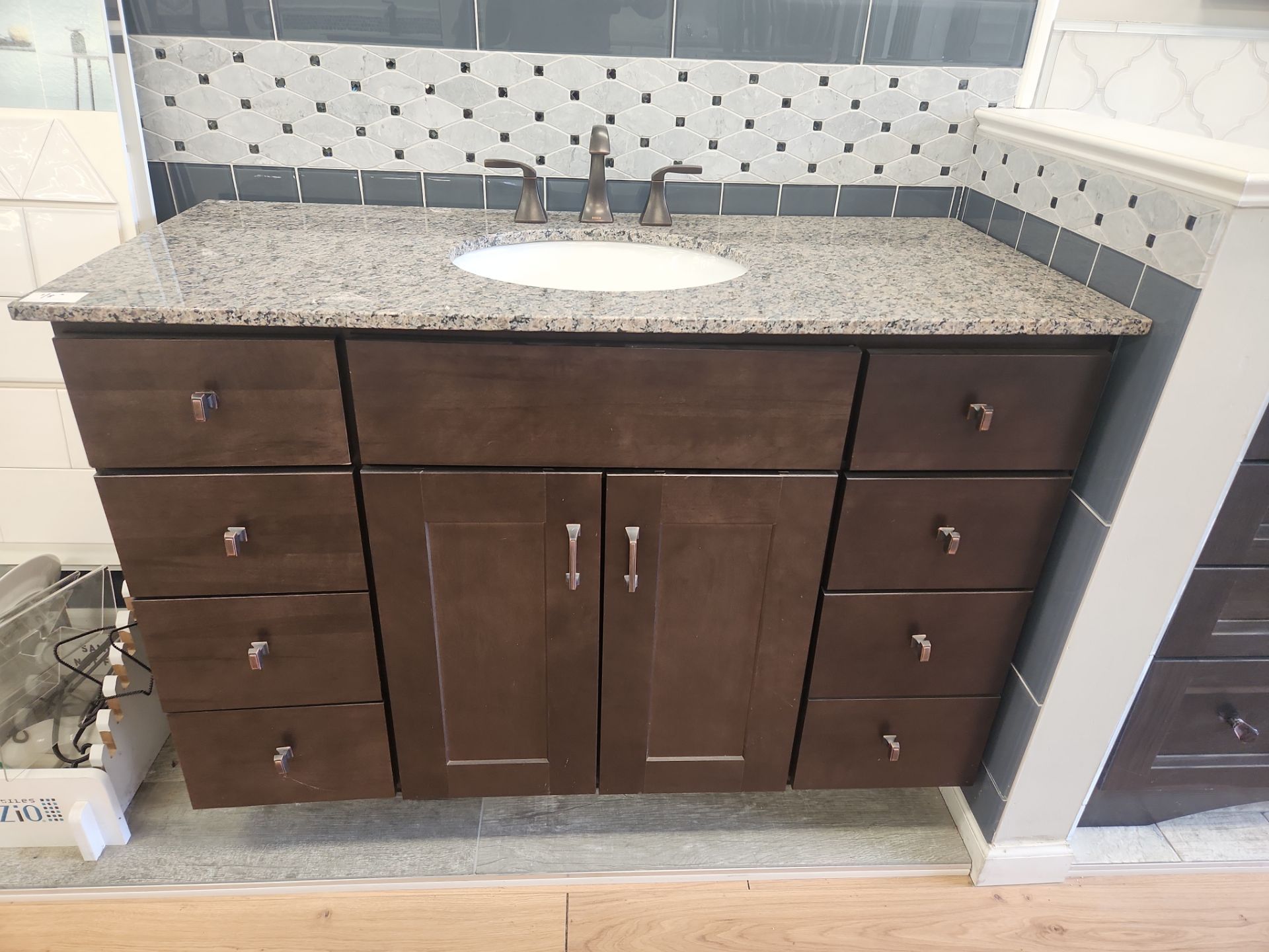 Luxury transitional furniture-grade bathroom vanity suite including faucet