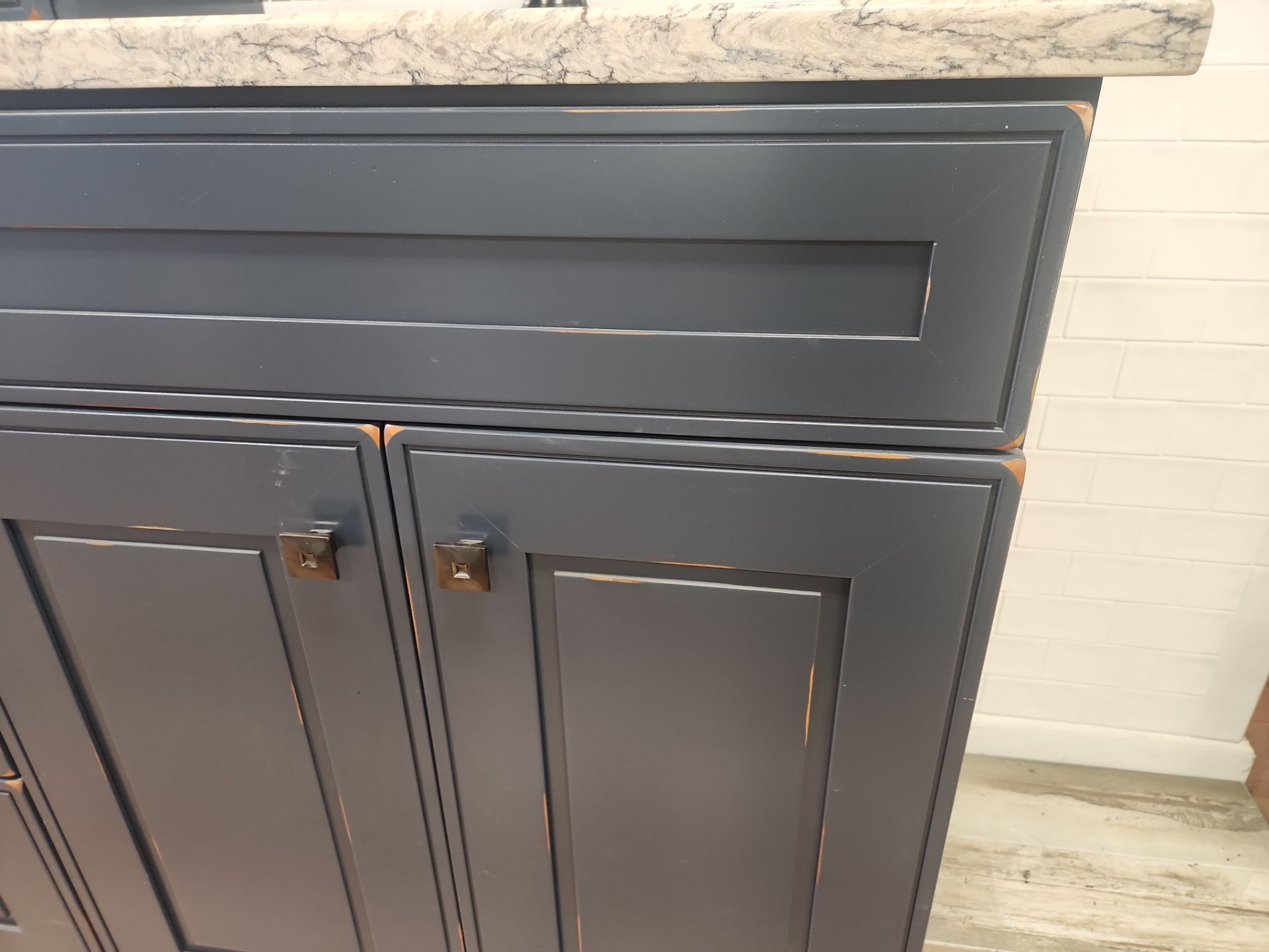 Complete 46" navy bathroom vanity with integrated sink and matching storage unit