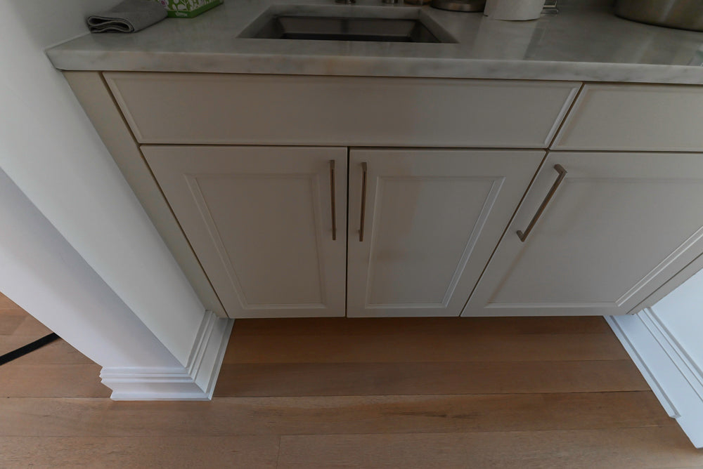 Kitchen cabinet with a sink and countertop