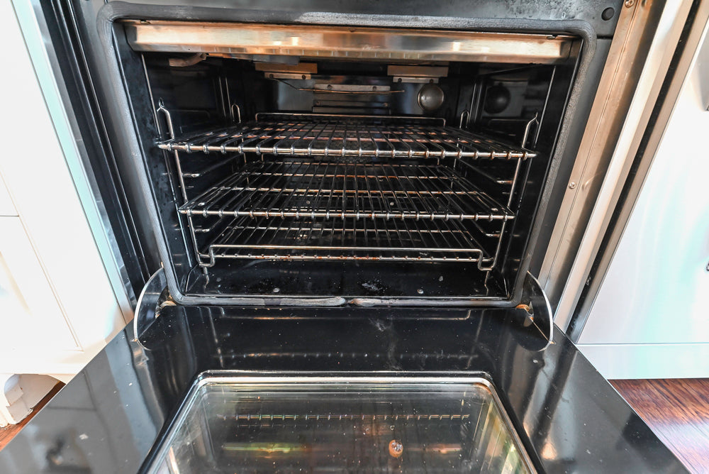 "The Berkley" Transitional White Kitchen with Island and 60" Wolf Range