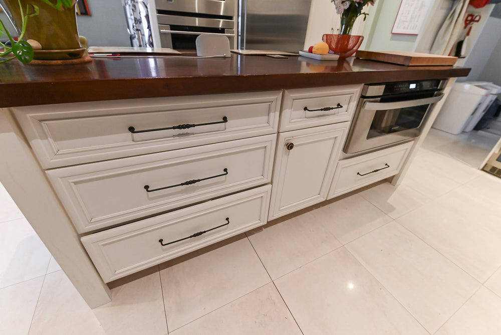 Candelight Traditional Off White Kitchen with Island and Monogram Appliances