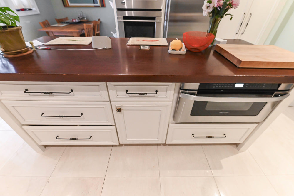 Candelight Traditional Off White Kitchen with Island and Monogram Appliances