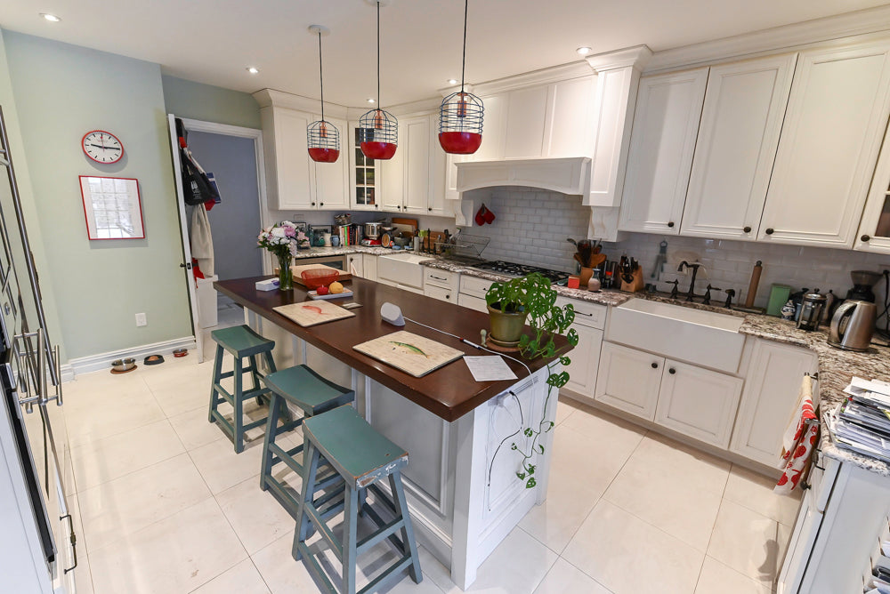 Candelight Traditional Off White Kitchen with Island and Monogram Appliances