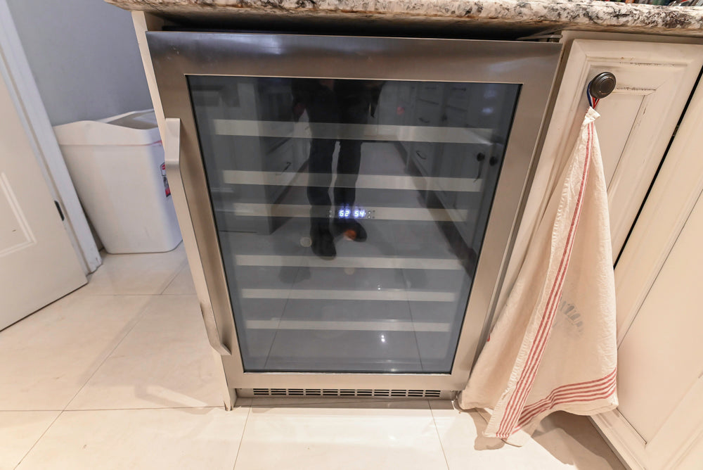 Candelight Traditional Off White Kitchen with Island and Monogram Appliances