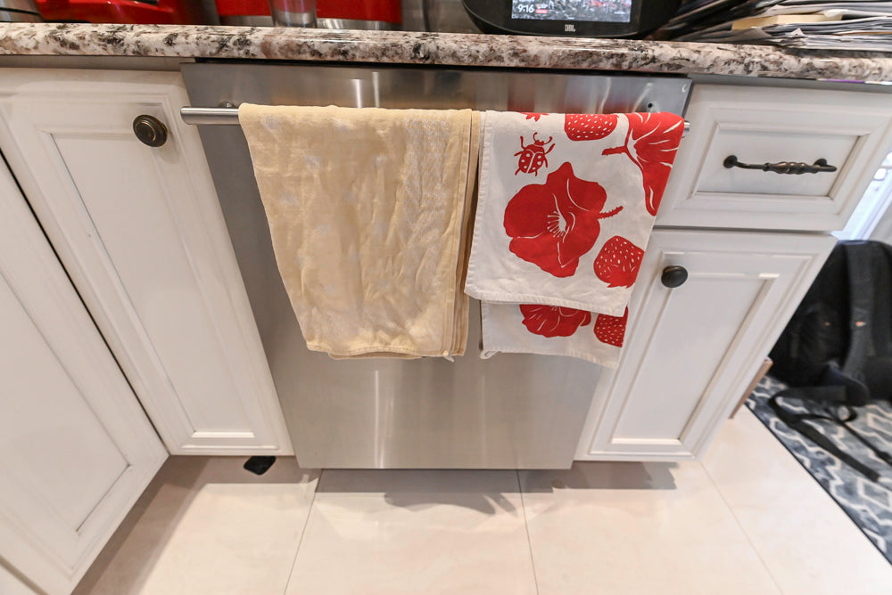 Candelight Traditional Off White Kitchen with Island and Monogram Appliances