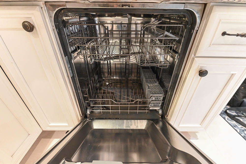 Candelight Traditional Off White Kitchen with Island and Monogram Appliances