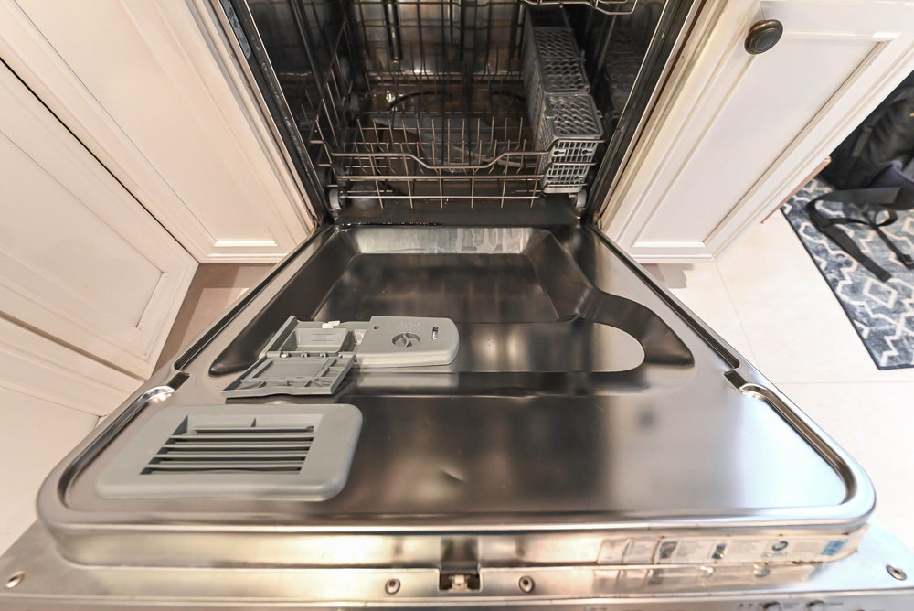 Candelight Traditional Off White Kitchen with Island and Monogram Appliances