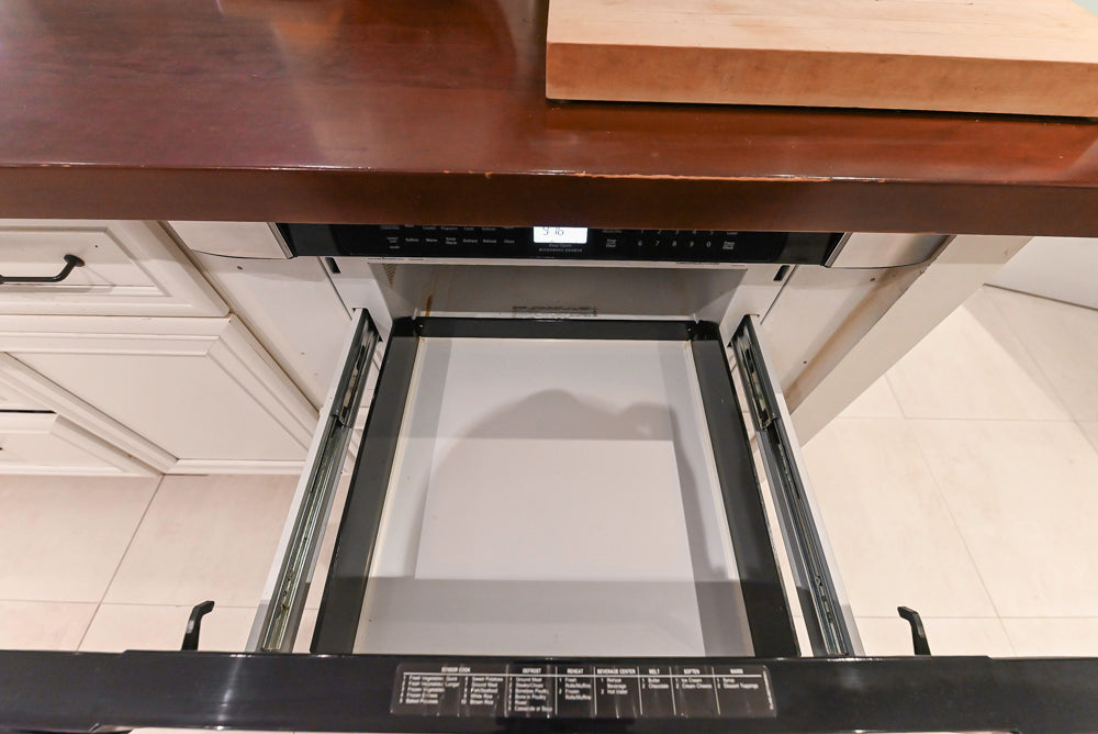 Candelight Traditional Off White Kitchen with Island and Monogram Appliances