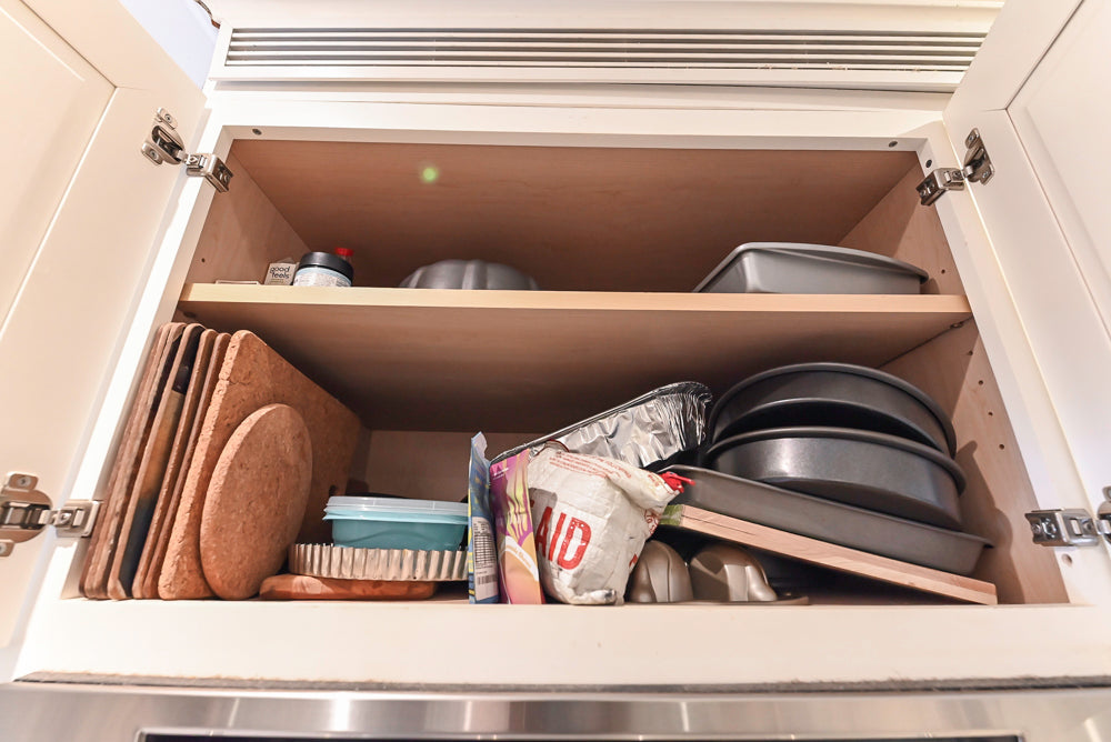 Candelight Traditional Off White Kitchen with Island and Monogram Appliances