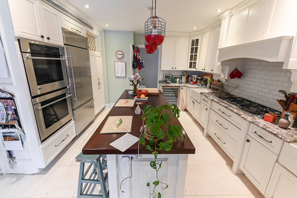 Candelight Traditional Off White Kitchen with Island and Monogram Appliances
