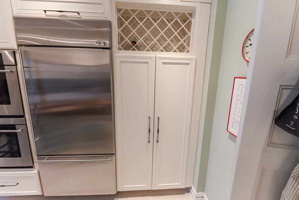 Candelight Traditional Off White Kitchen with Island and Monogram Appliances