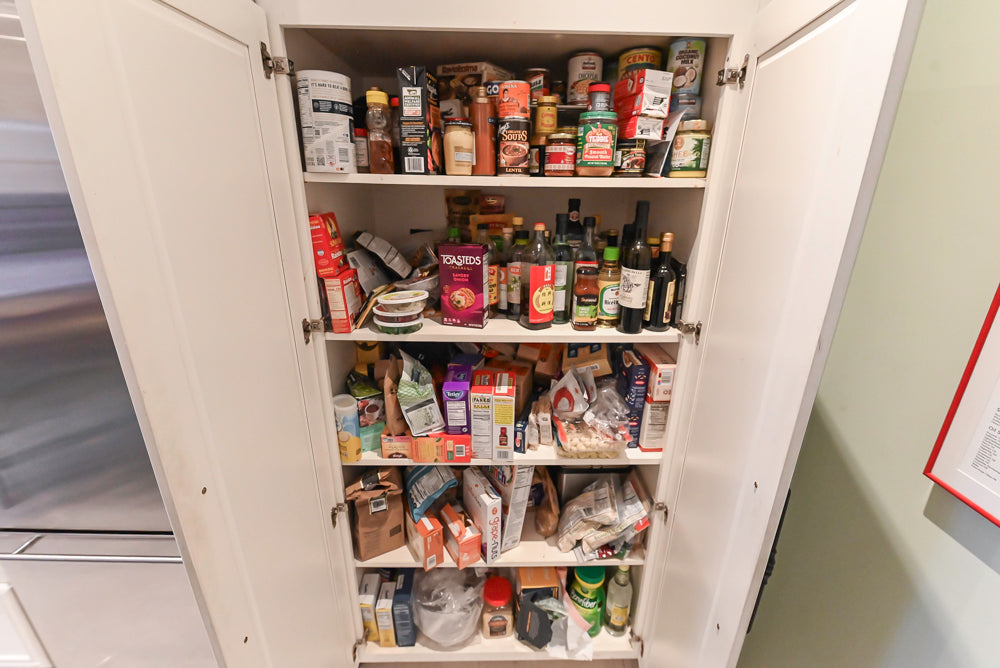 Candelight Traditional Off White Kitchen with Island and Monogram Appliances